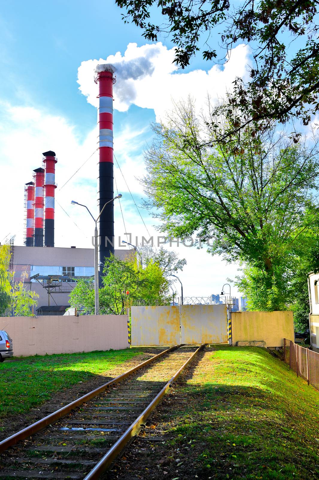 Pollution of atmospheric air from the chimneys of plants.