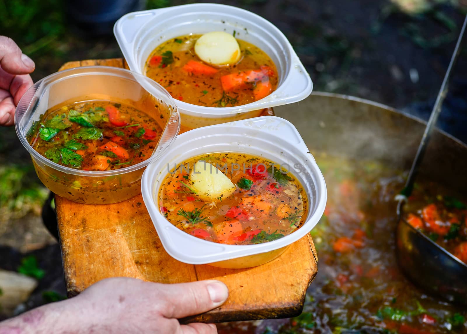 Hot soup in a tourist bowler on a picnic.