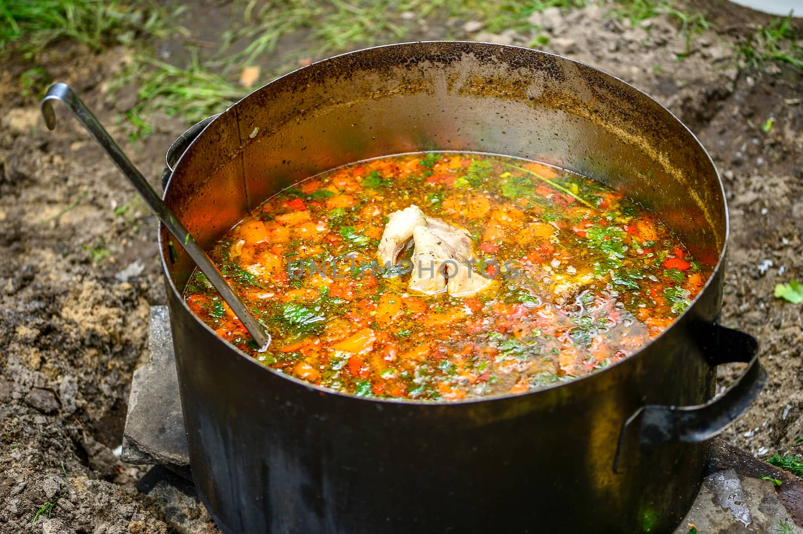 Hot soup in a tourist bowler on a picnic.