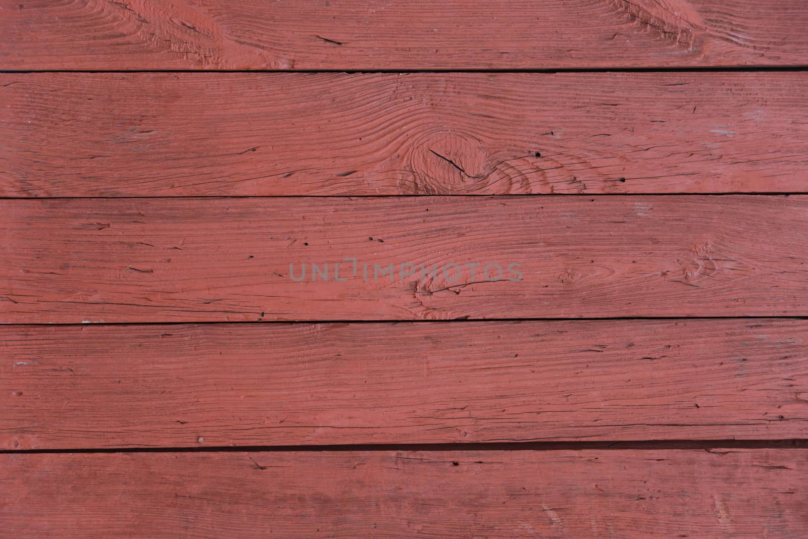 Background of horizontal wooden boards, painted with red color