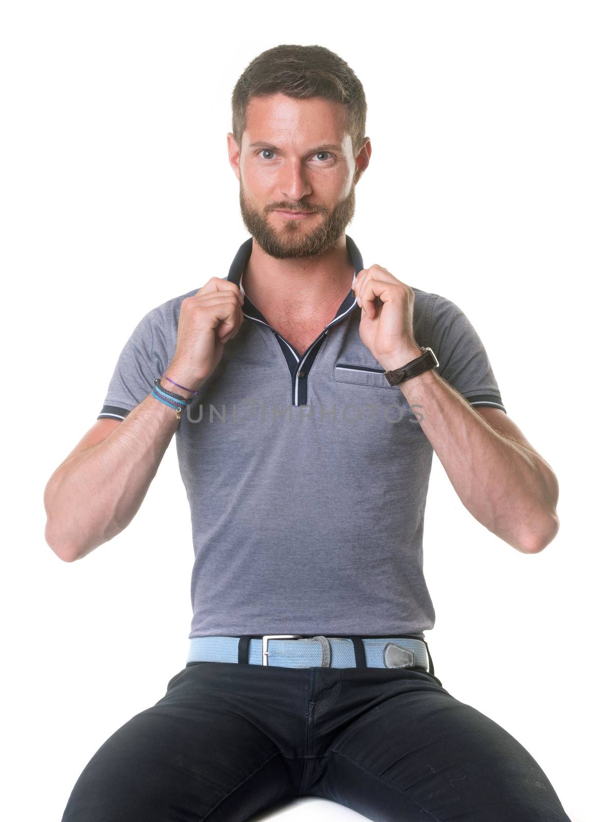 young bearded man in front of white background