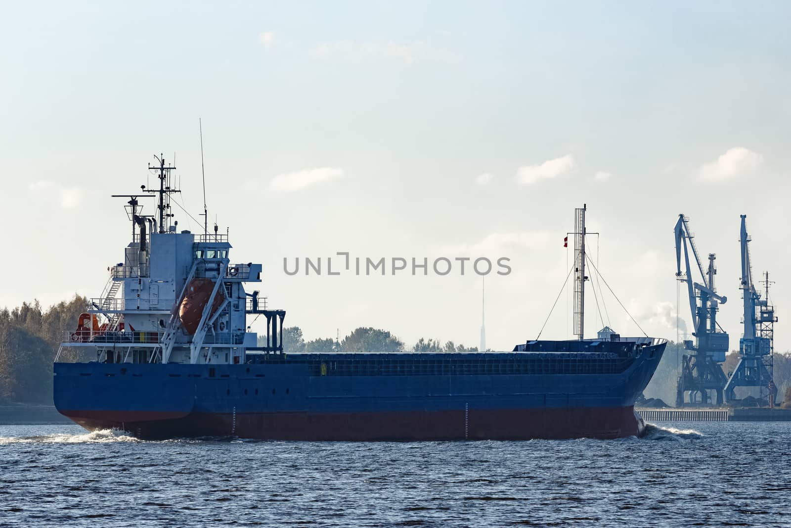 Blue cargo ship sailing from the Baltic sea