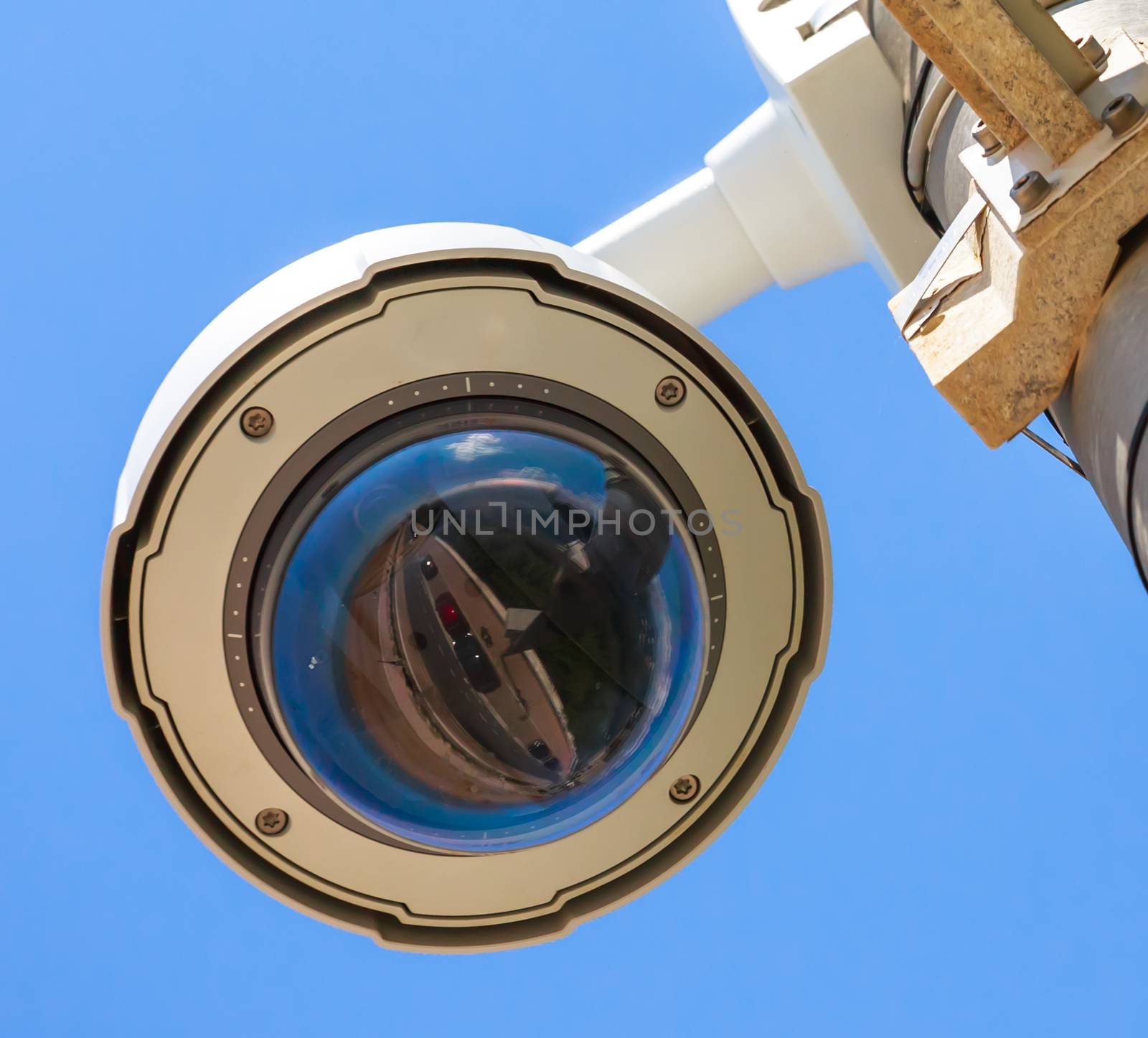 Security CCTV camera under blue sky by pixinoo