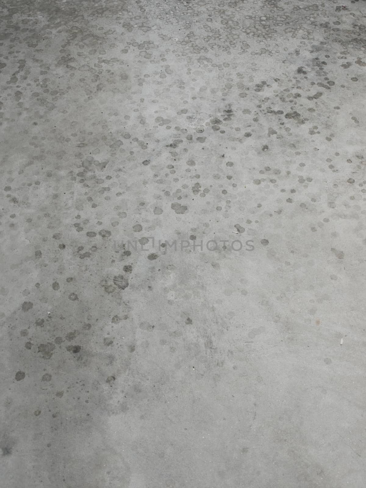 PHOTO OF RAINDROPS TEXTURE ON PLAIN CONCRETE BACKGROUND