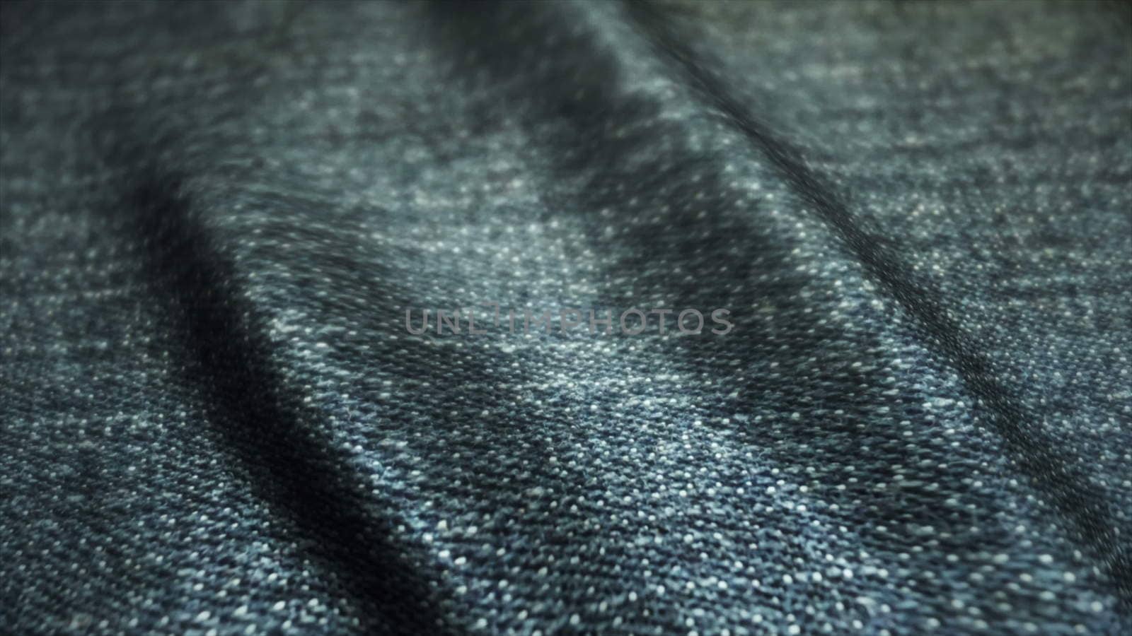 Realistic jeans waving in the wind. Abstract background Ultra-HD resolution. Close-up fabric texture. Seamless loop.