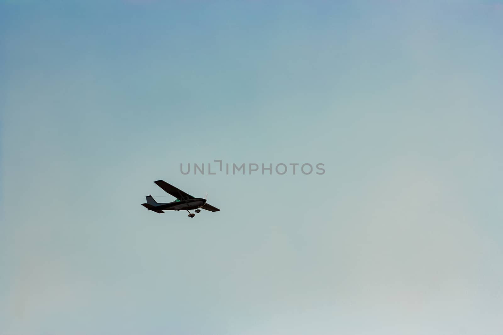 Passenger aircraft flying in the blue sky