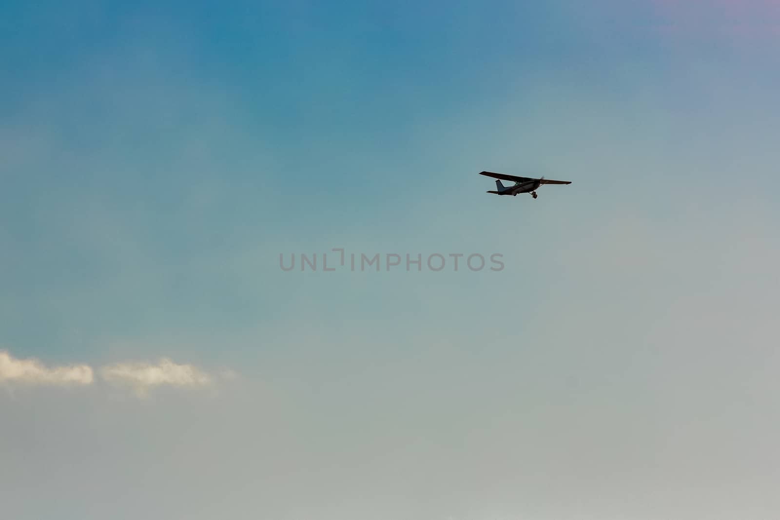 Passenger aircraft flying in the blue sky