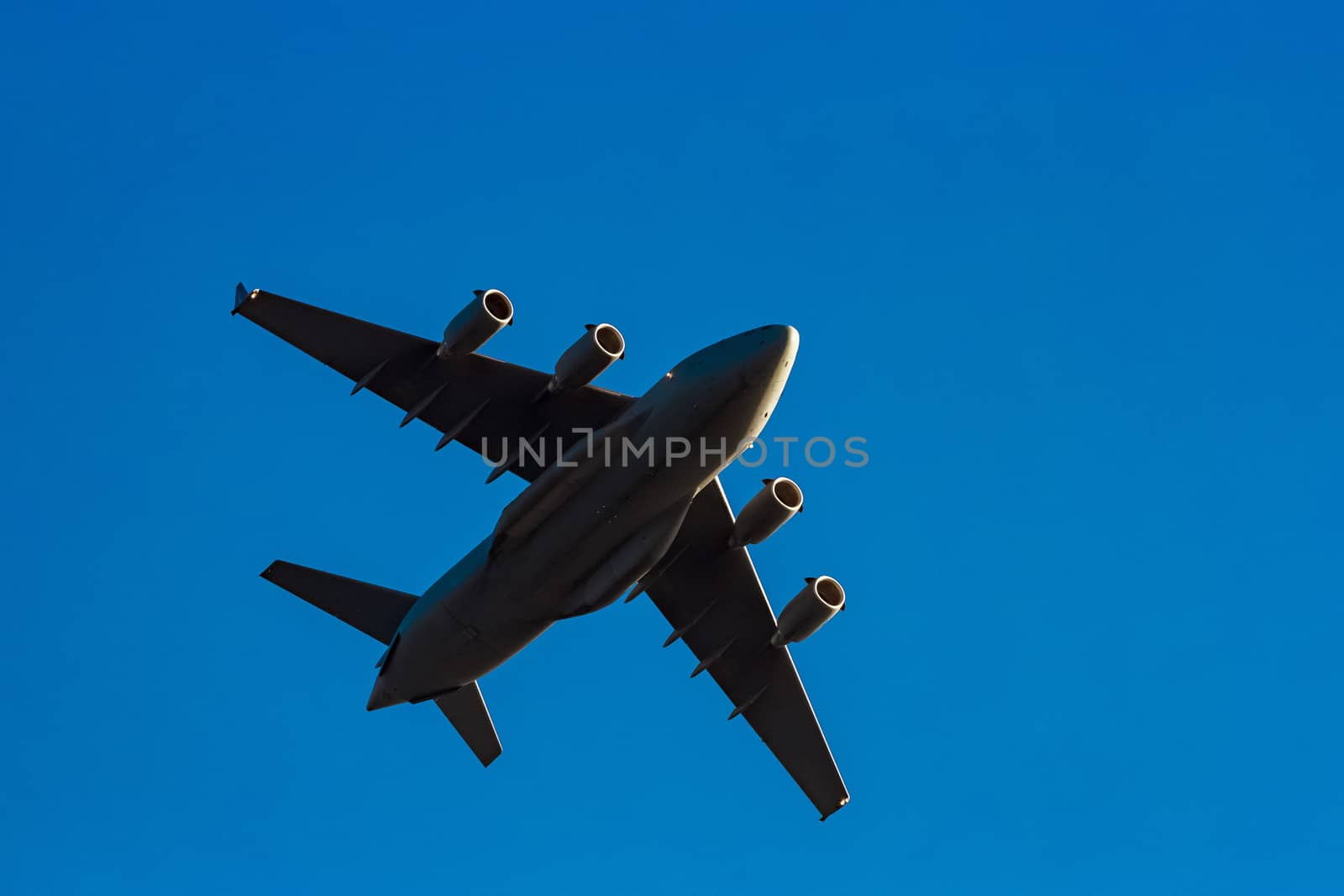 Passenger aircraft flying in the blue sky