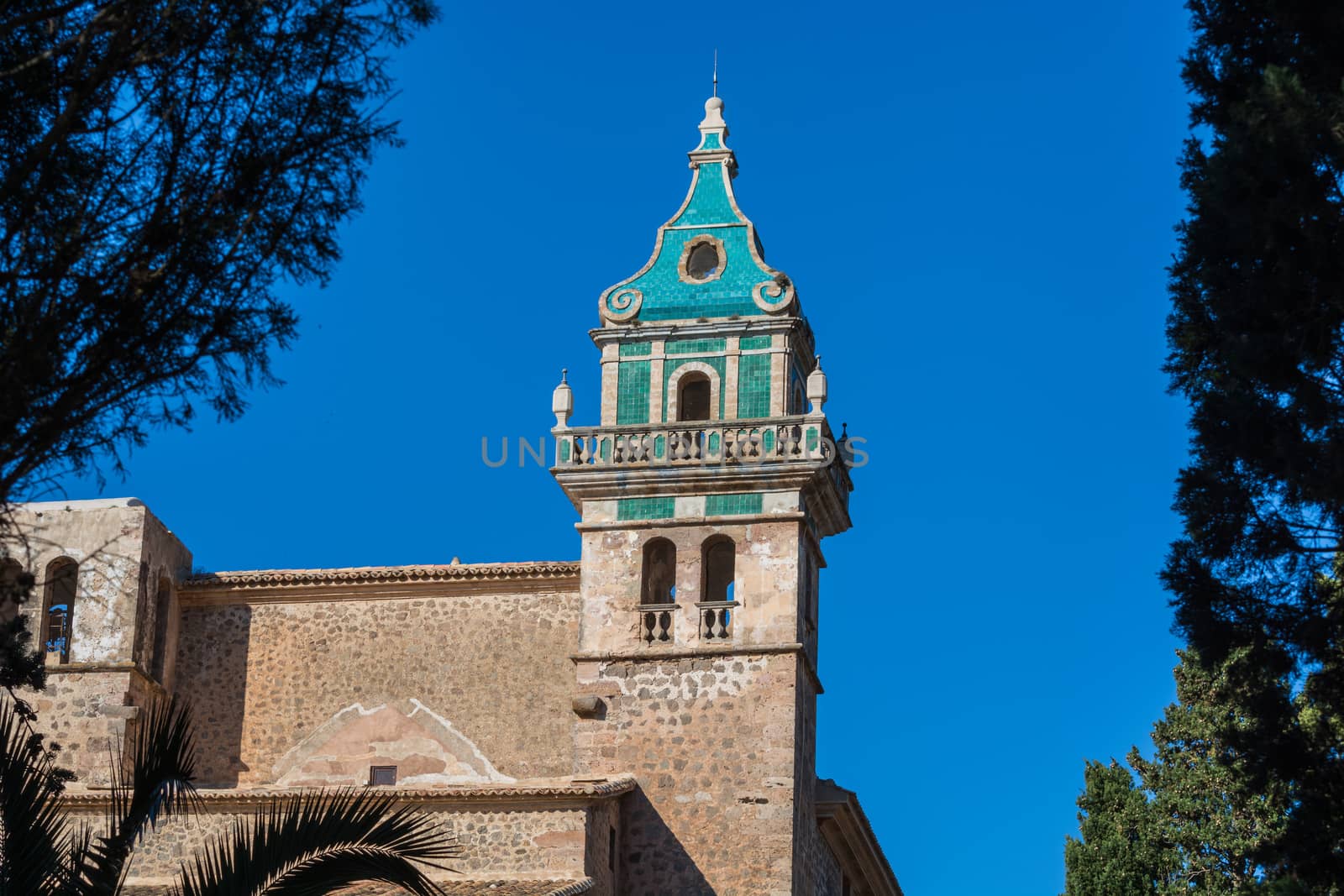 Beautiful view. Tower of the monastery in Valldemossa. Close to the Sierra de Tramuntana.
