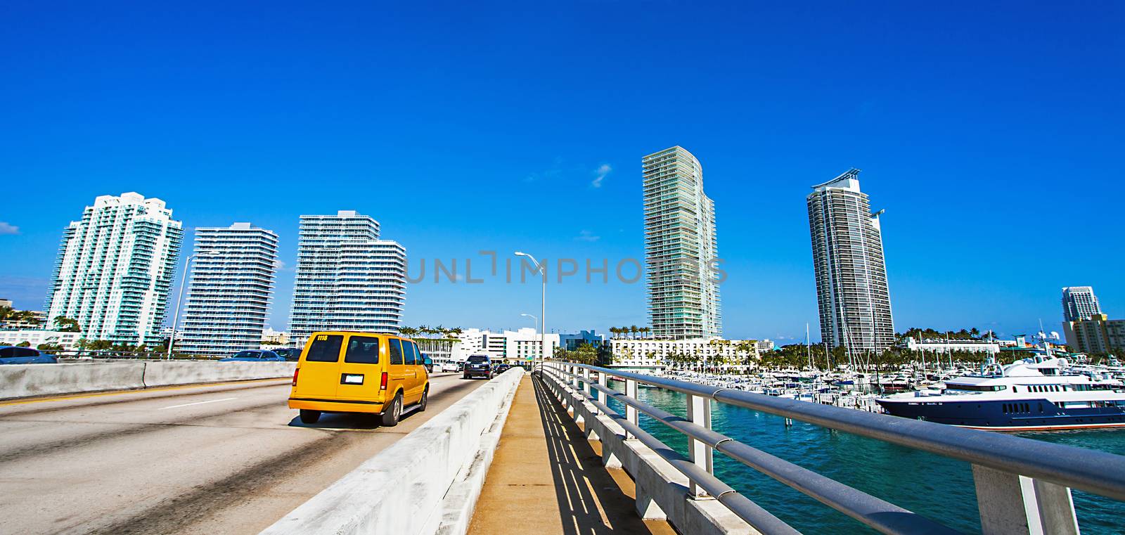 Taxi on a bridge in Miami Florida USA by Makeral