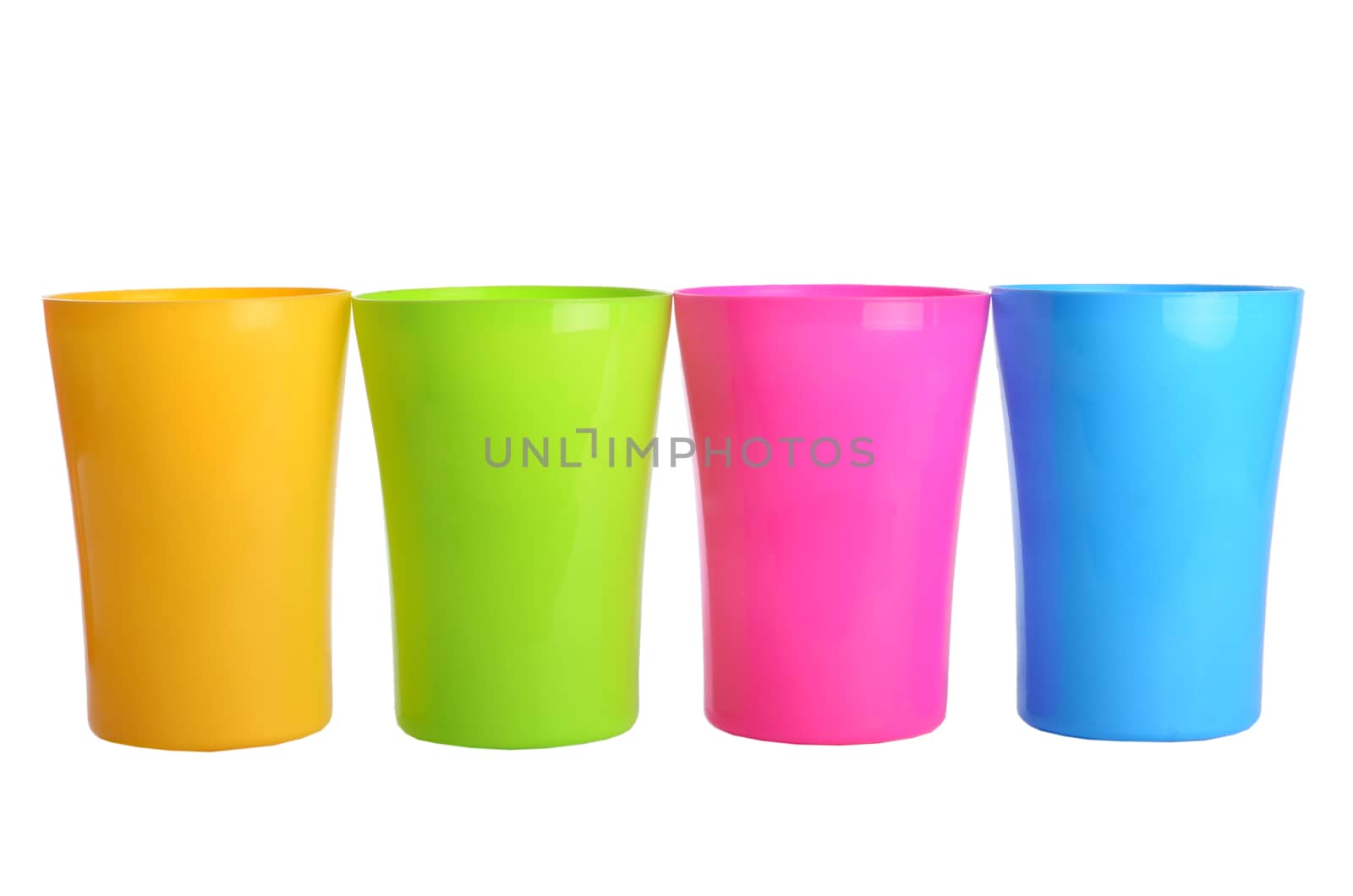 Plastic colorful cups isolated on white background