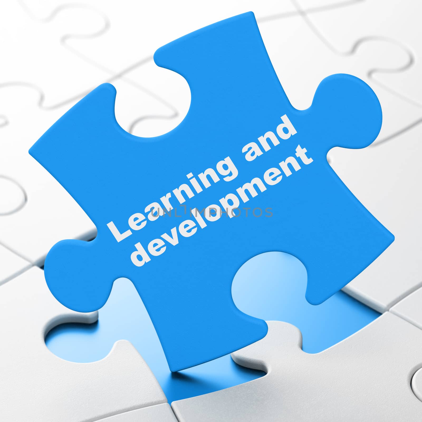 Education concept: Learning And Development on Blue puzzle pieces background, 3D rendering