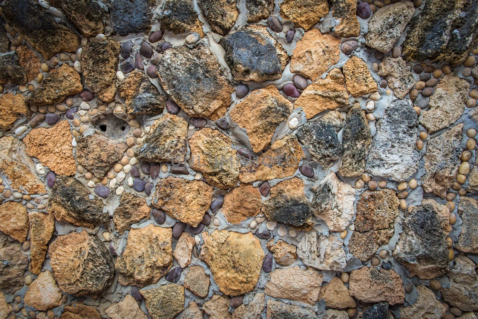 Background of stone wall texture abstract for design.