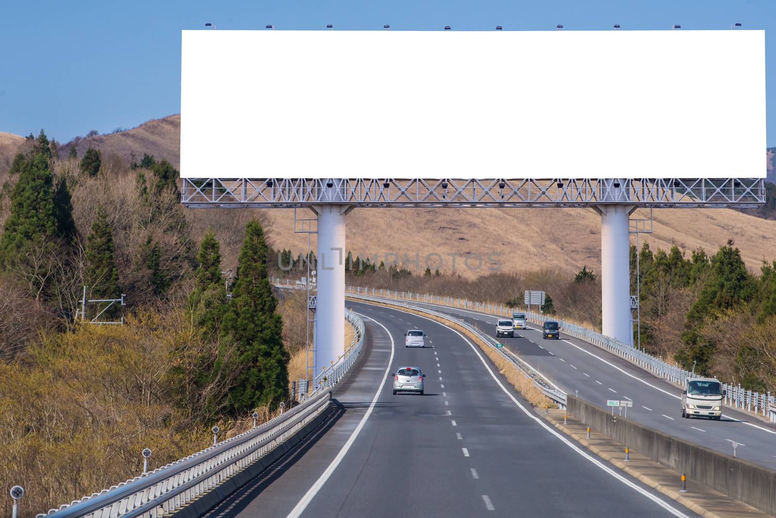 billboard blank on countryside road for advertising background by casanowe