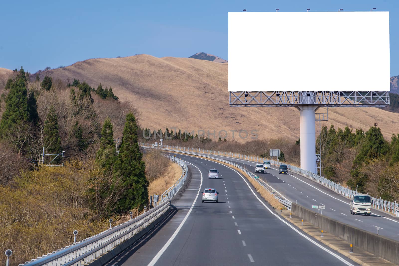 billboard blank on countryside road for advertising background by casanowe