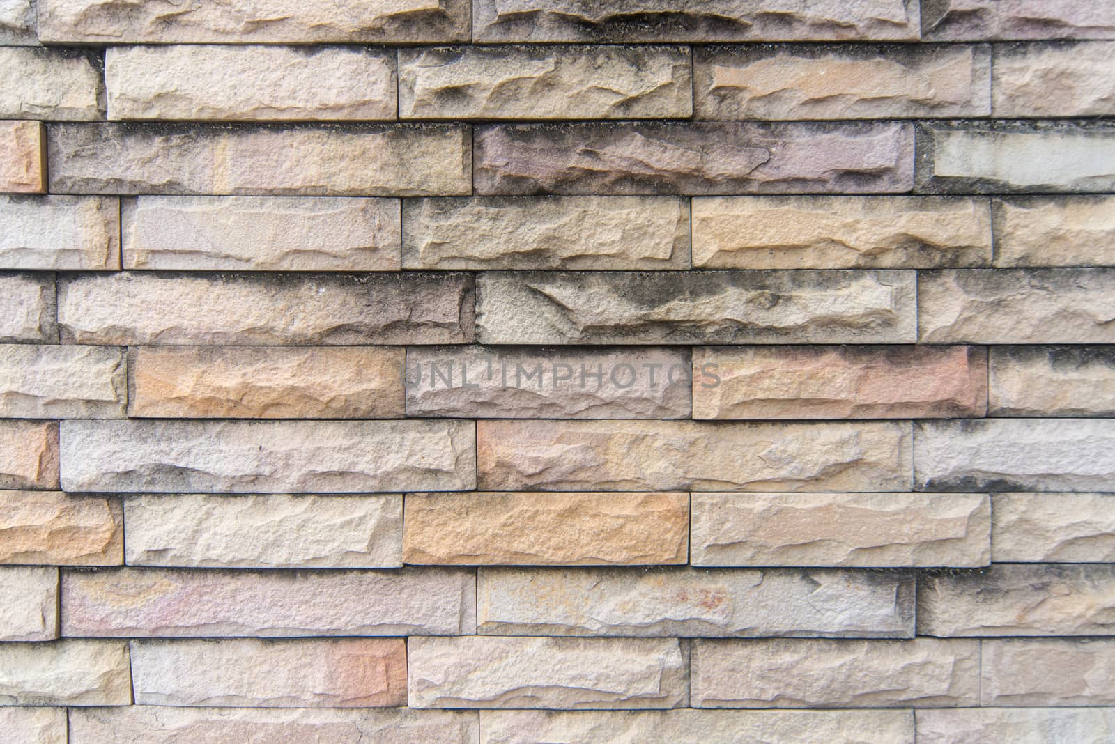Brown marble brick wall abstract for background.