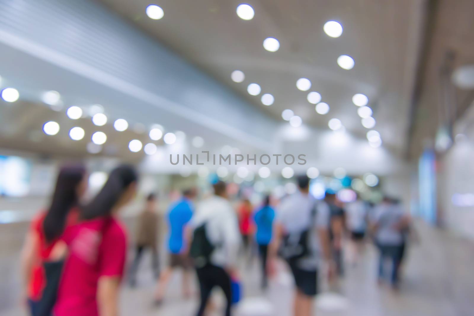 blur People Walking in the corridor of business center.