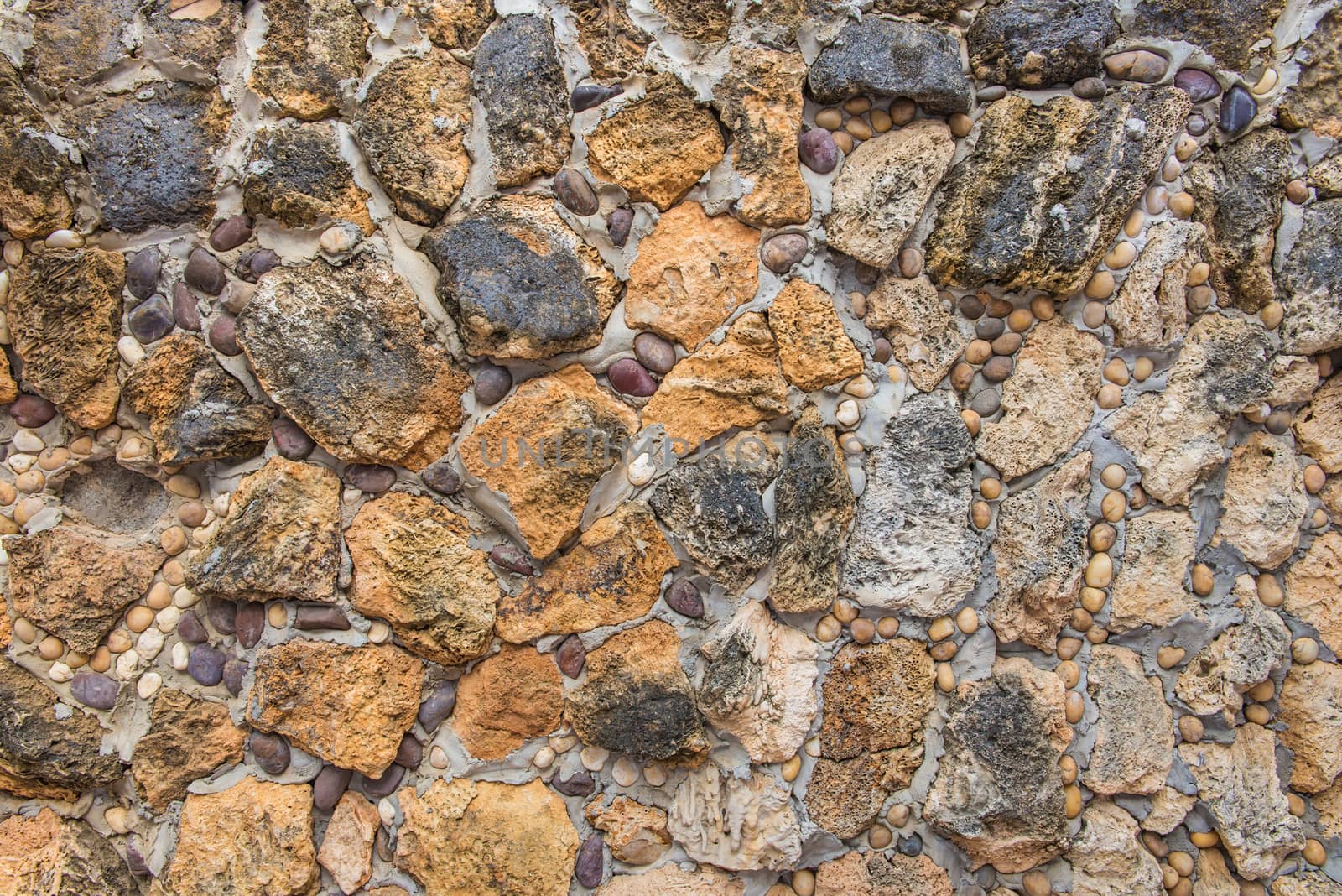 Background of stone wall texture abstract for design.
