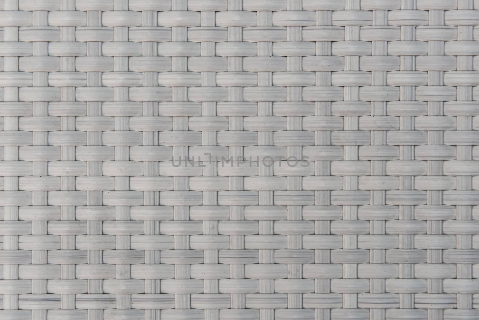 texture of plastic rattan weaving design for background.