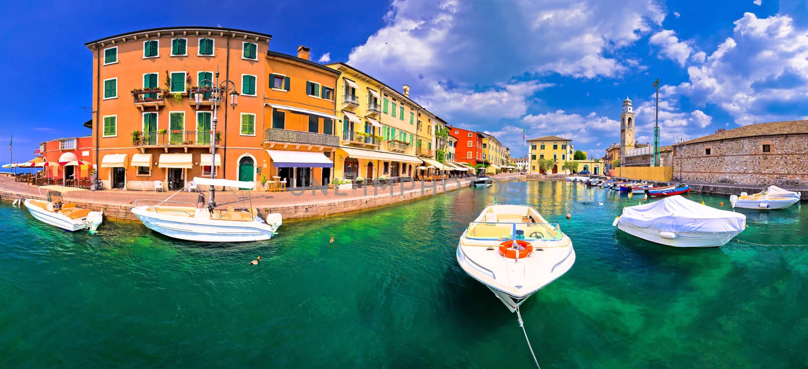 Lazise colorful harbor and boats panoramic view by xbrchx