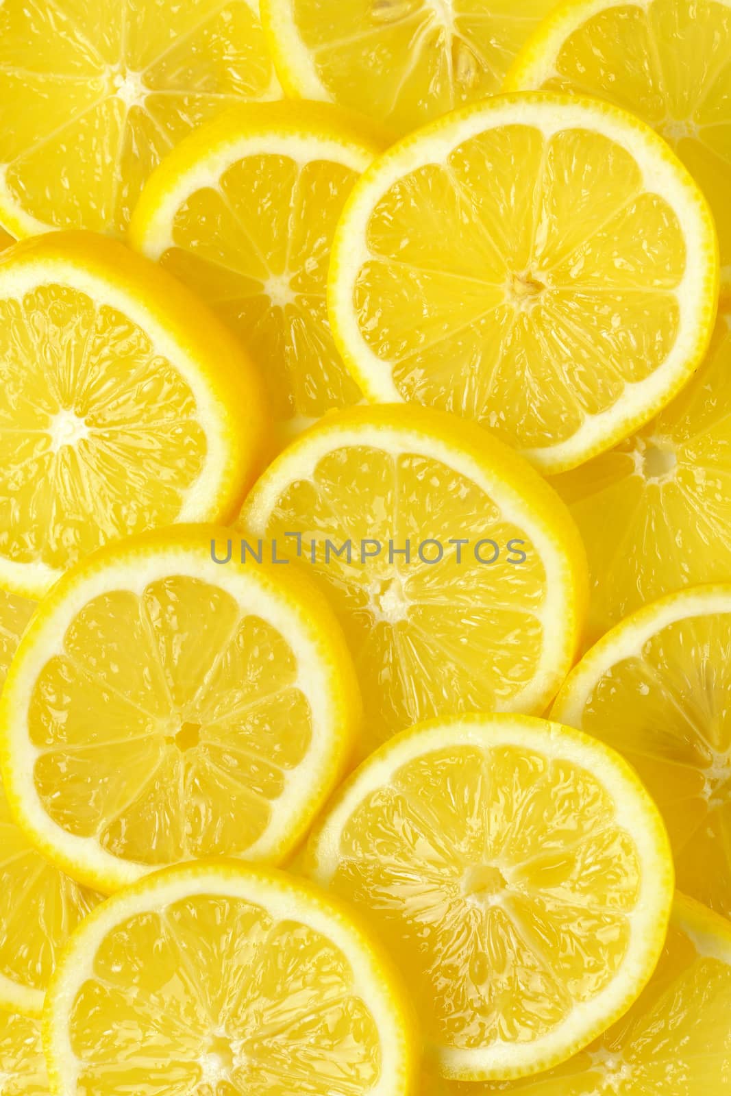 heap of fresh lemon slices - full frame