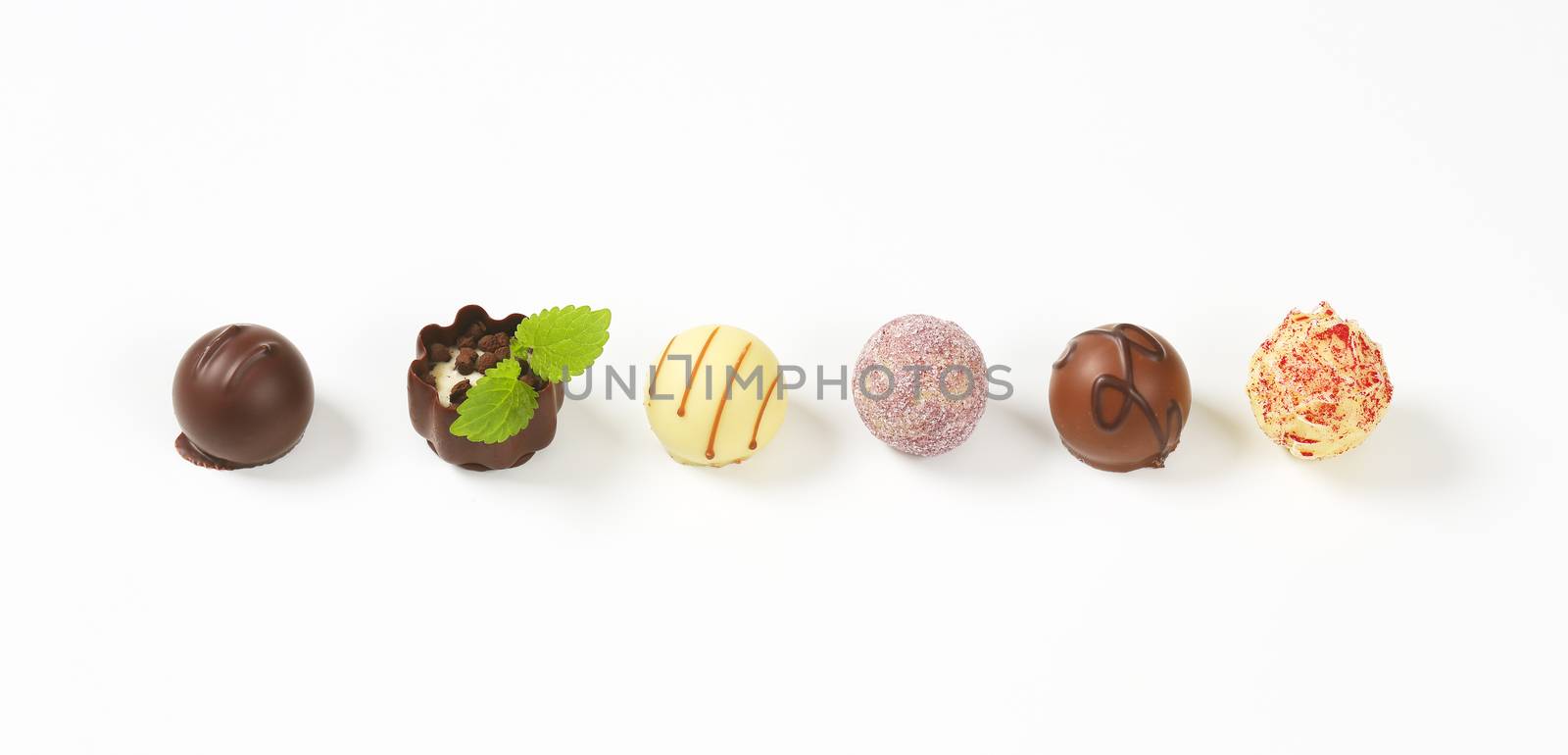assorted chocolate pralines by Digifoodstock