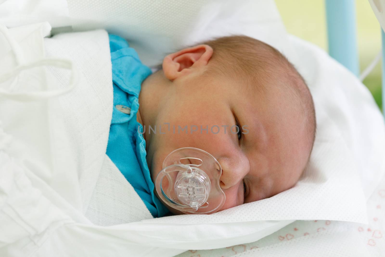 Newborn baby infant in the hospital by artush
