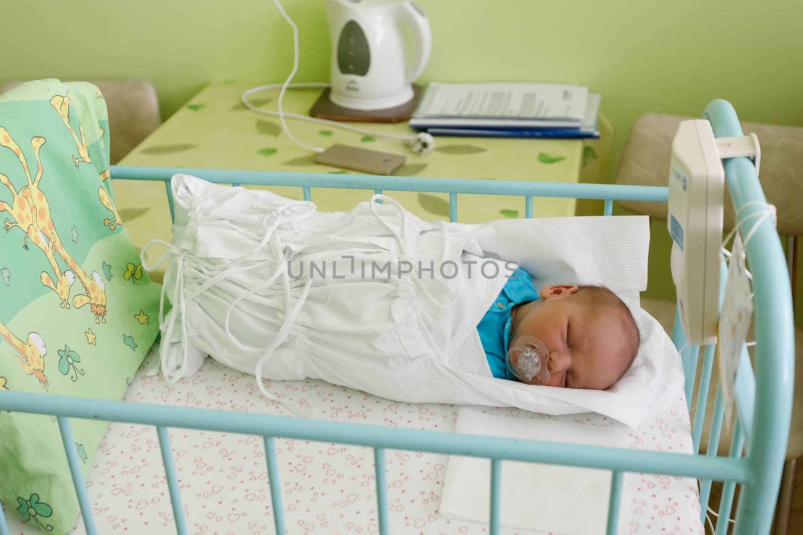 Newborn baby infant in the hospital by artush