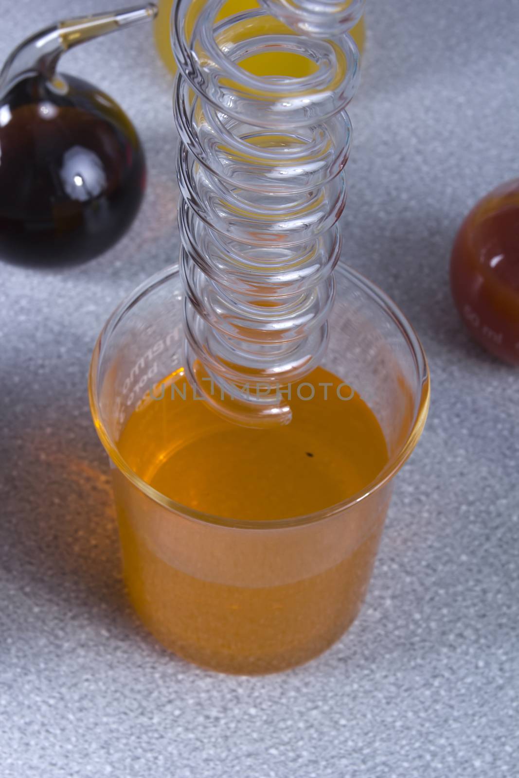 Liquids of different colors in laboratory containers