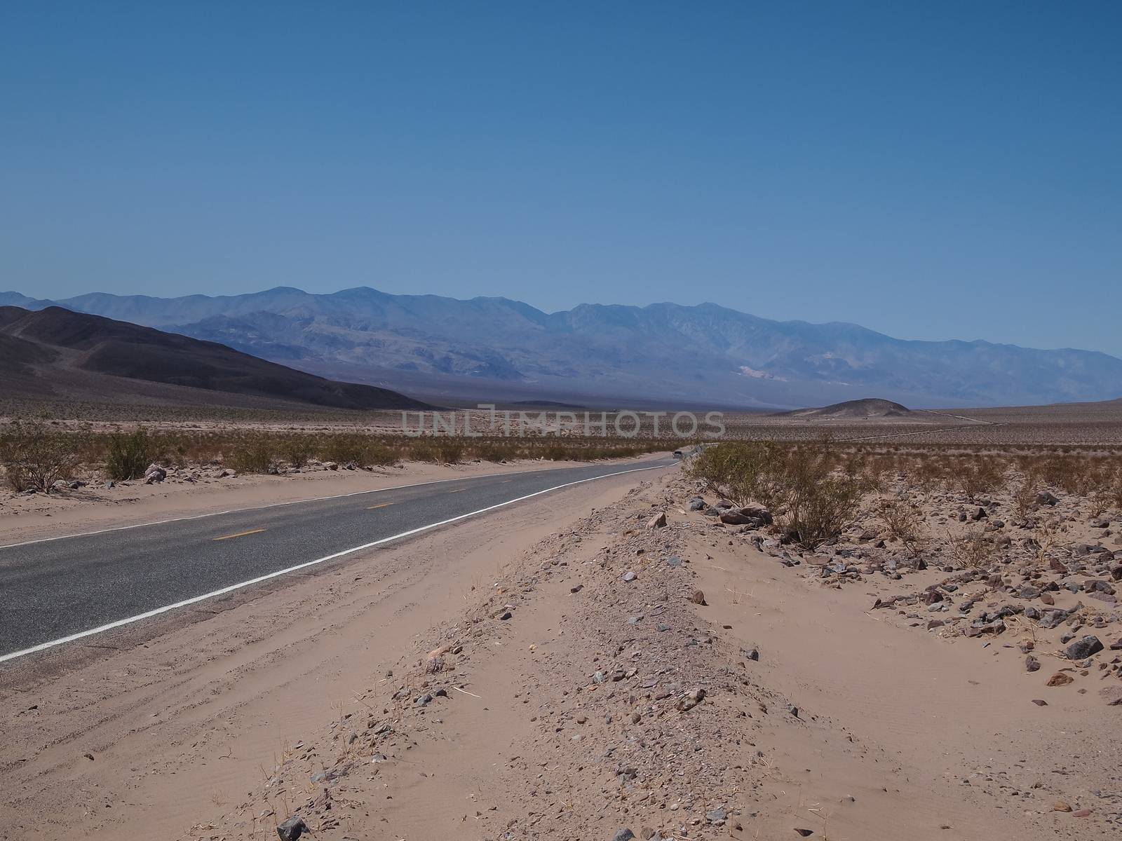 Driving through the desert in Death Valley National Park , USA
