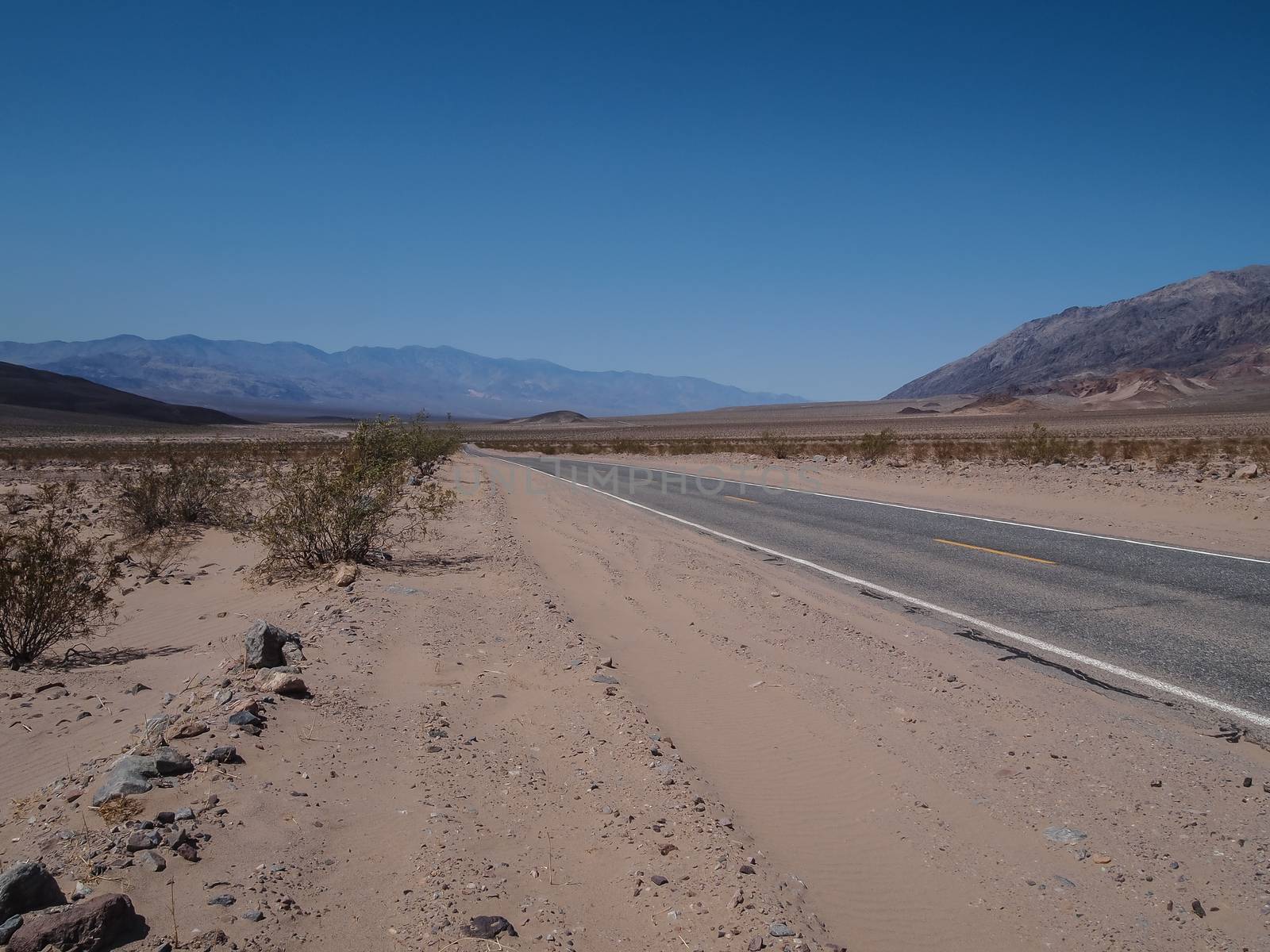 Driving through the desert in Death Valley by simpleBE