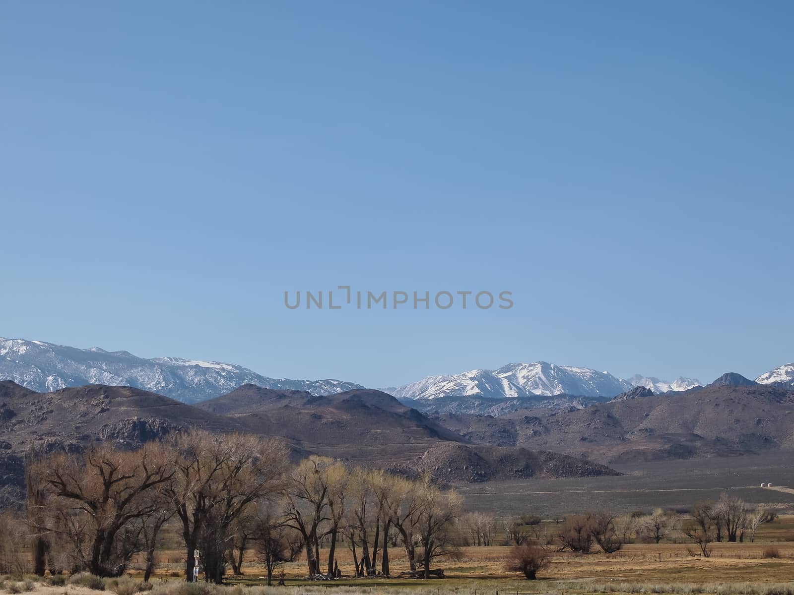 Snow capped mountains, blue sky, Desert landscape in California , USA