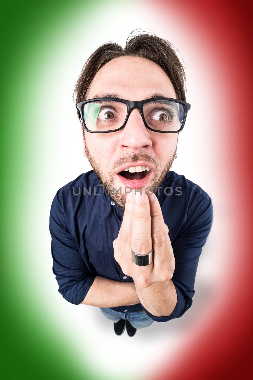Funny man doing typical Italian hand gesture meaning a general question