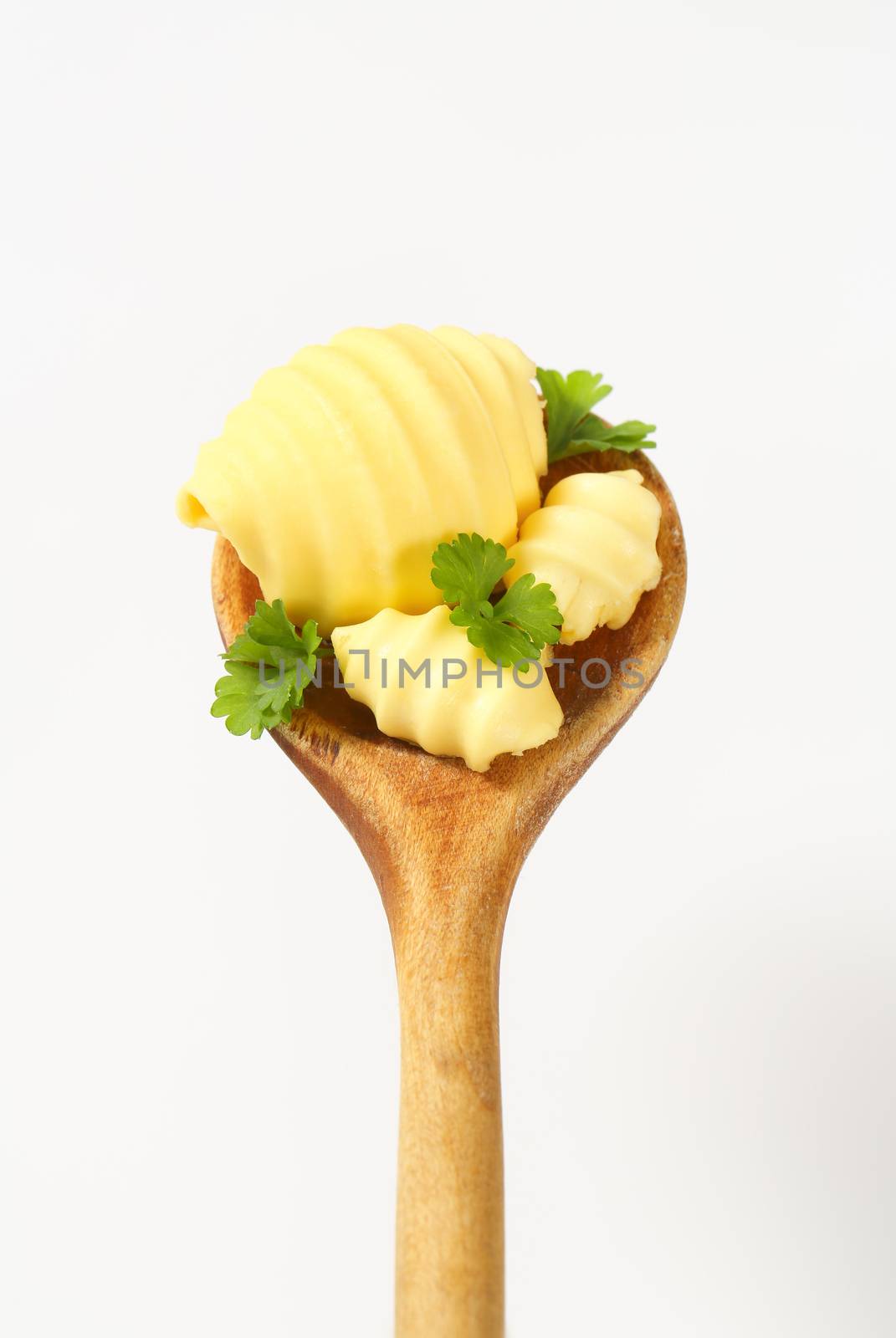 butter curls on spoon by Digifoodstock