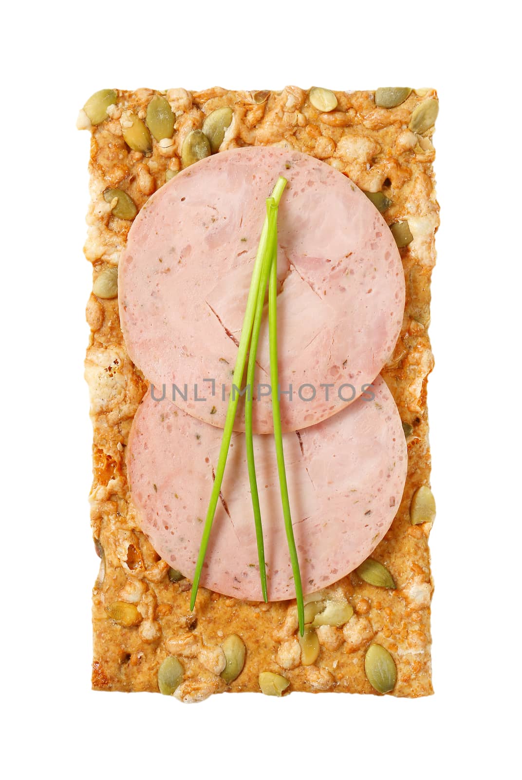 pumpkin seed cracker with soft sausage slices by Digifoodstock