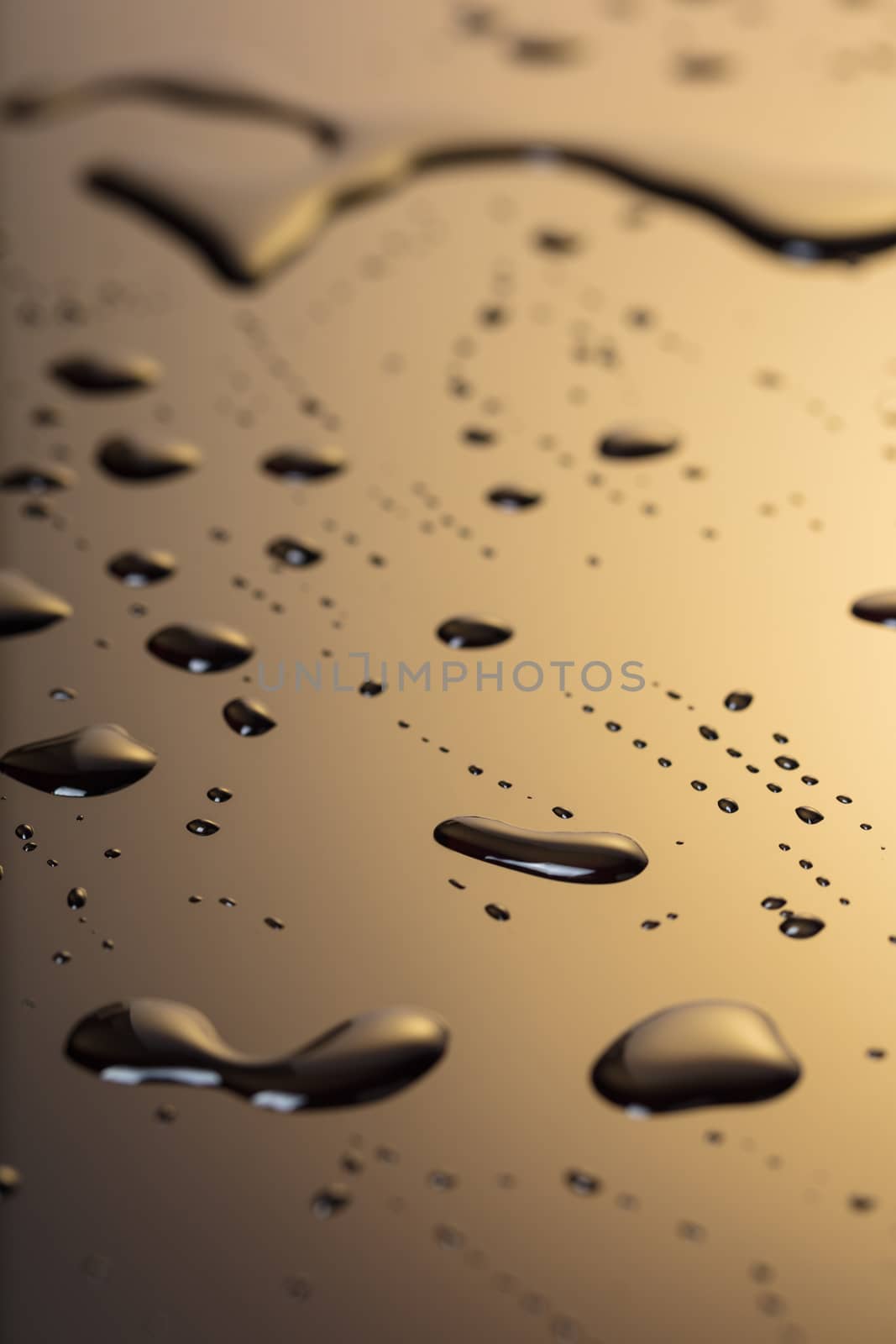 Abstract background, drops of water on a dark plastic