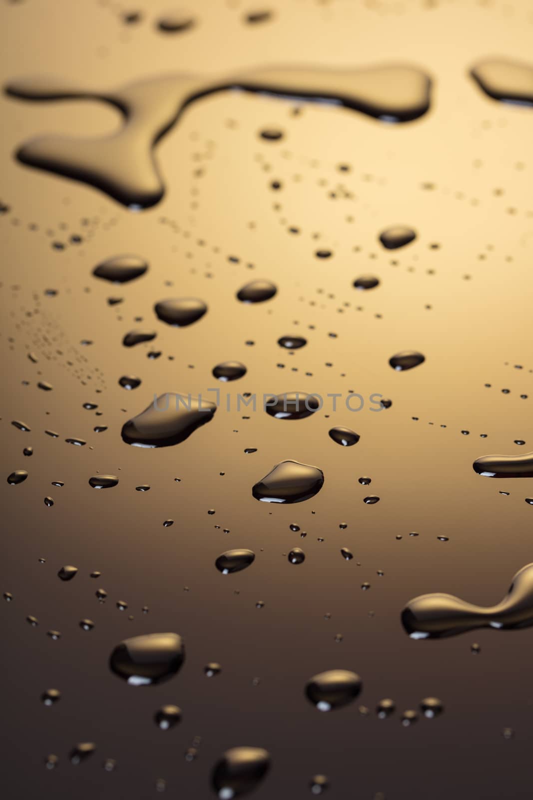 Abstract background, drops of water on a dark plastic