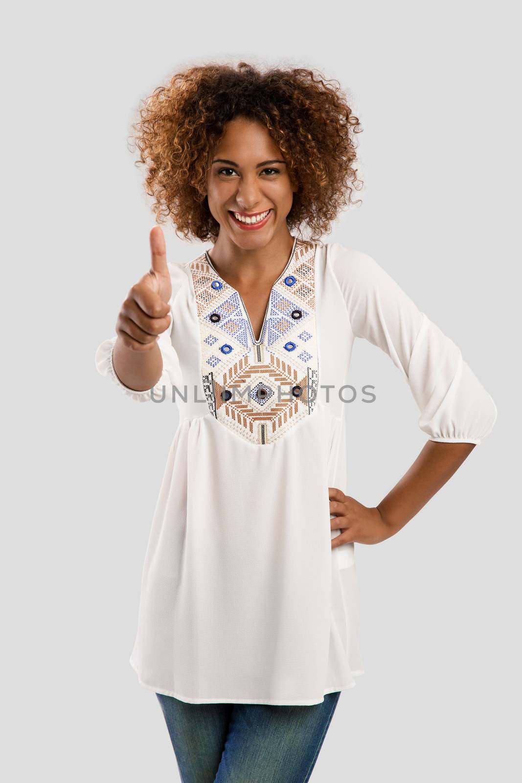 Beautiful African American woman with a thumbs up