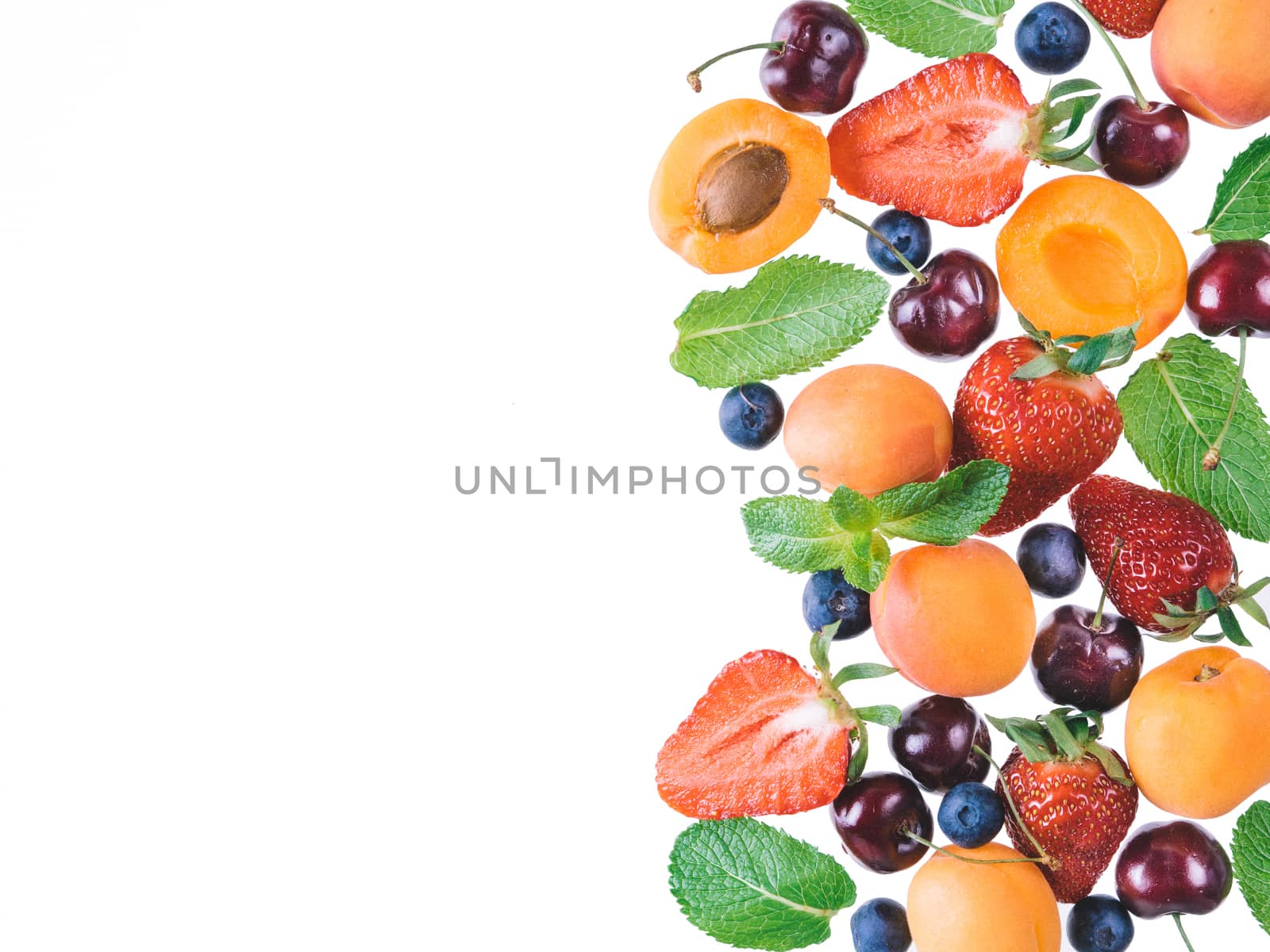 Apricot and berries isolated, top view, copy space by fascinadora