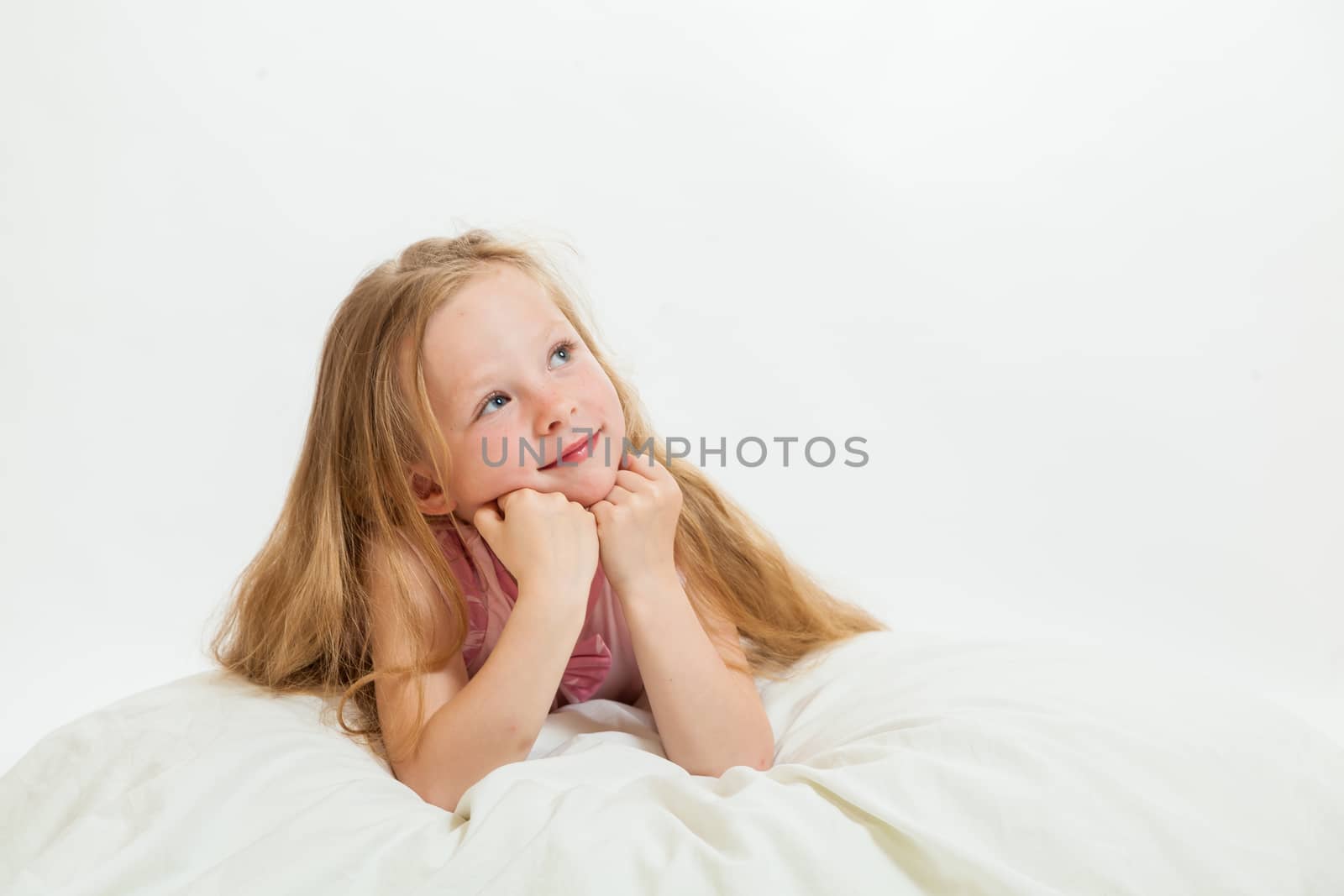 the beautiful little girl on the isolated background