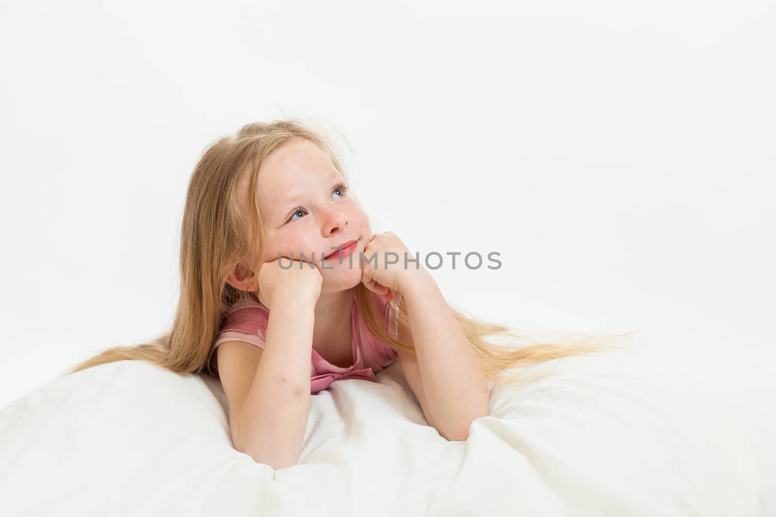 the beautiful little girl on the isolated background