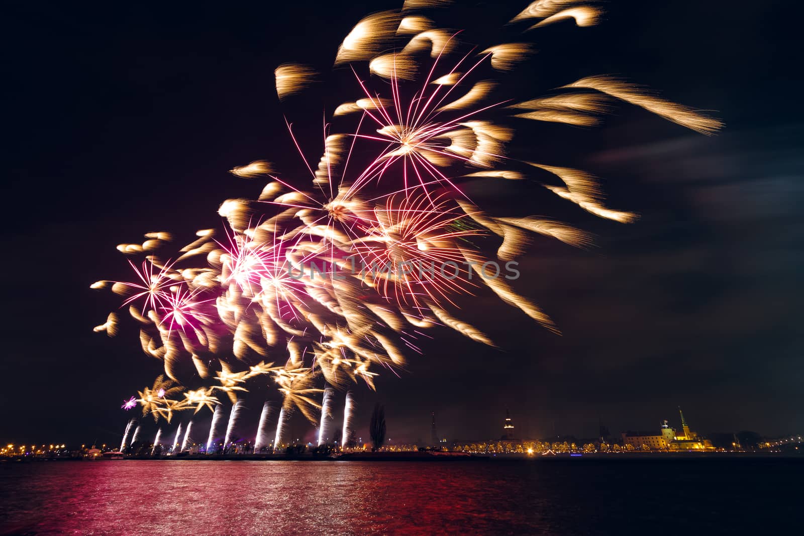 Colored New Year fireworks in centre of Riga