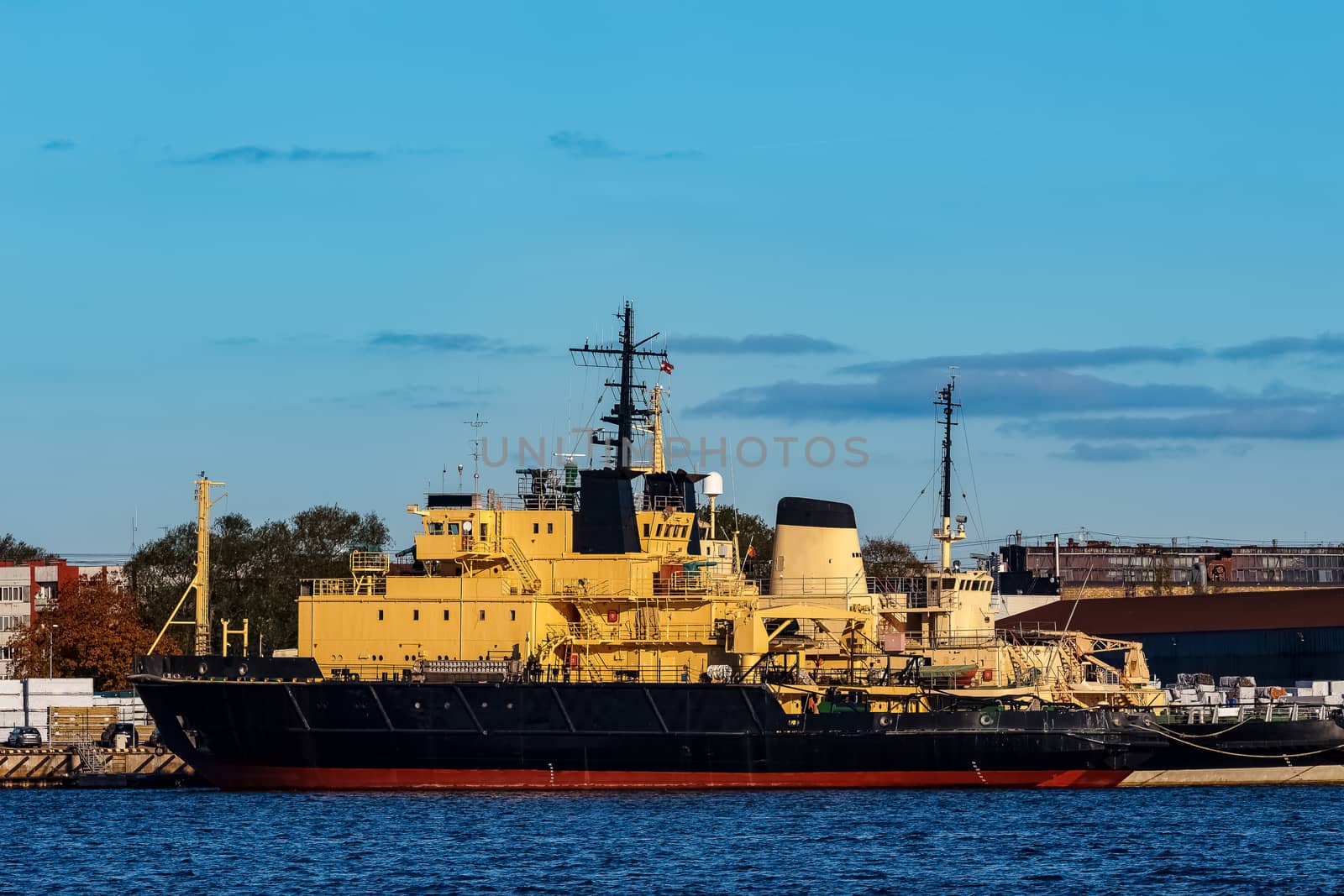 Yellow icebreakers moored at the port of Riga, Europe
