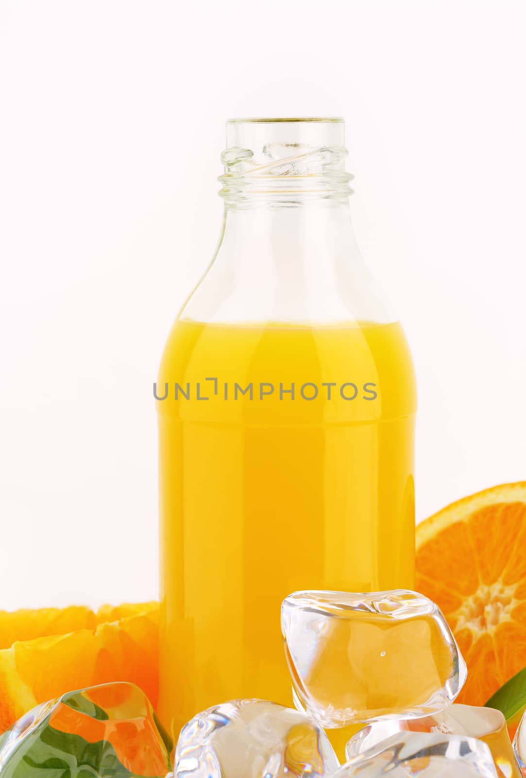 bottle of orange juice by Digifoodstock
