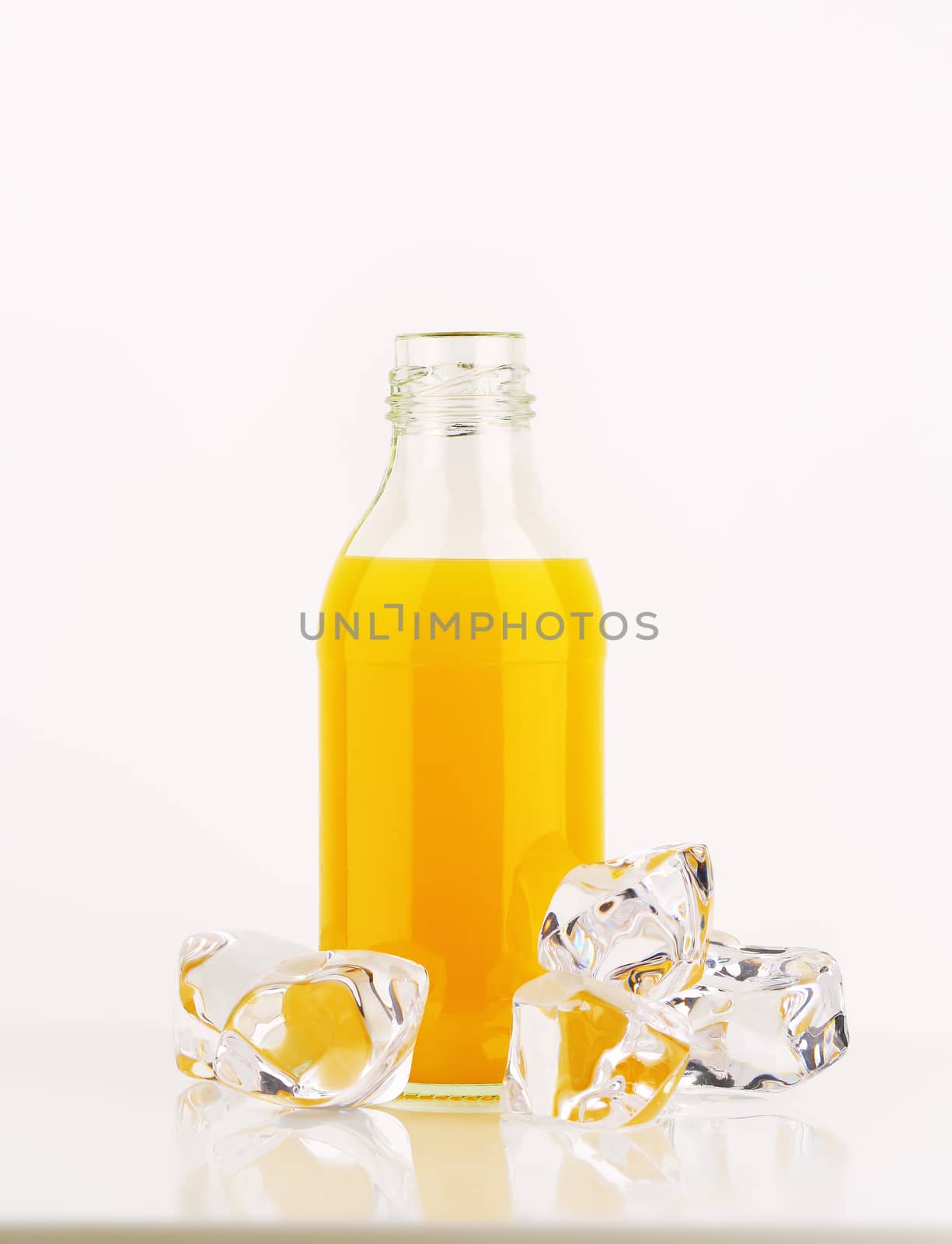 bottle of orange juice by Digifoodstock