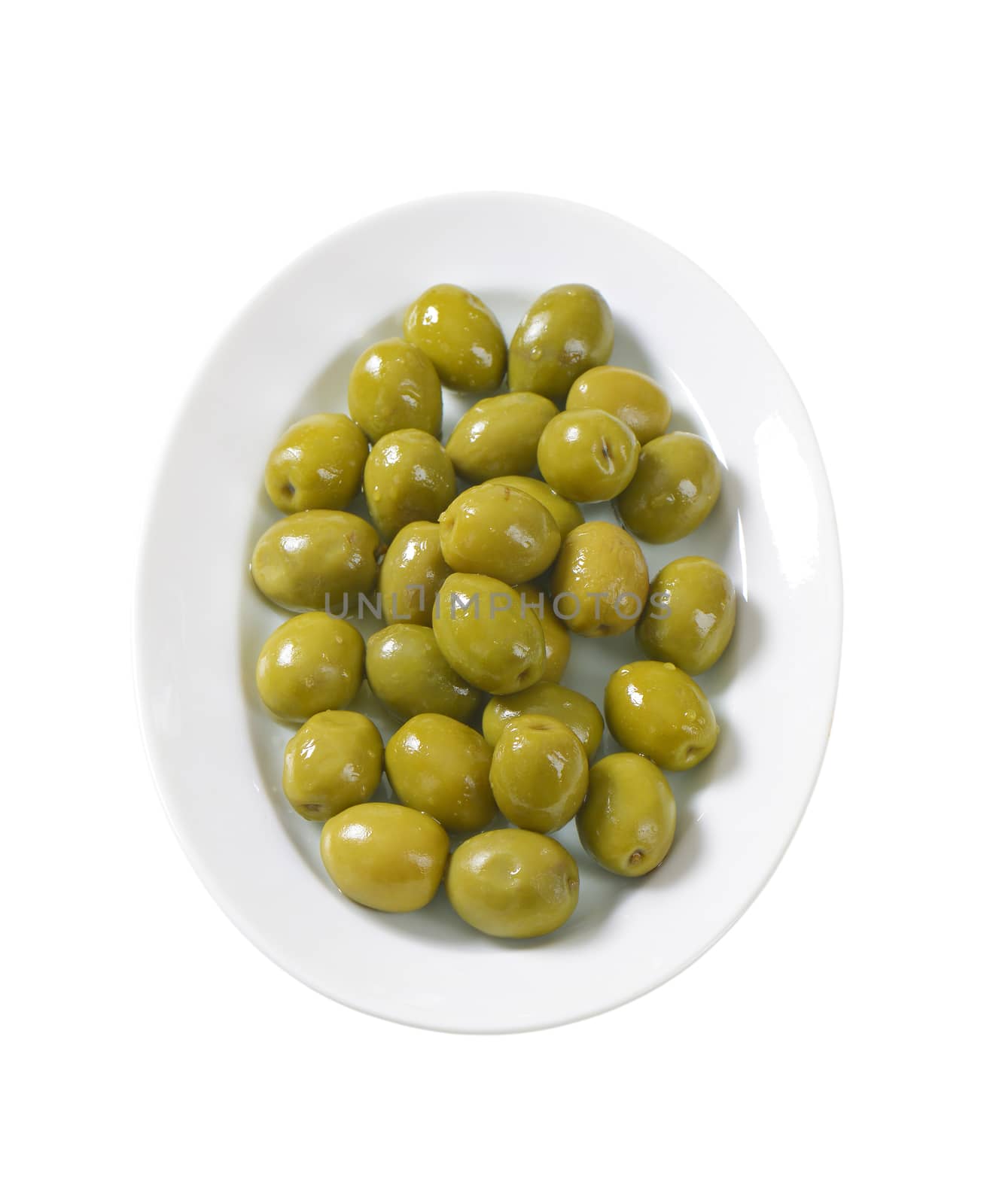 plate of green olives on white background