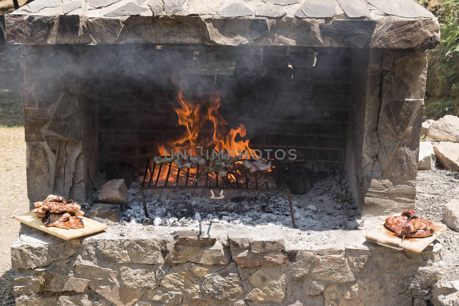 Meat roast in the barbecue in the countryside