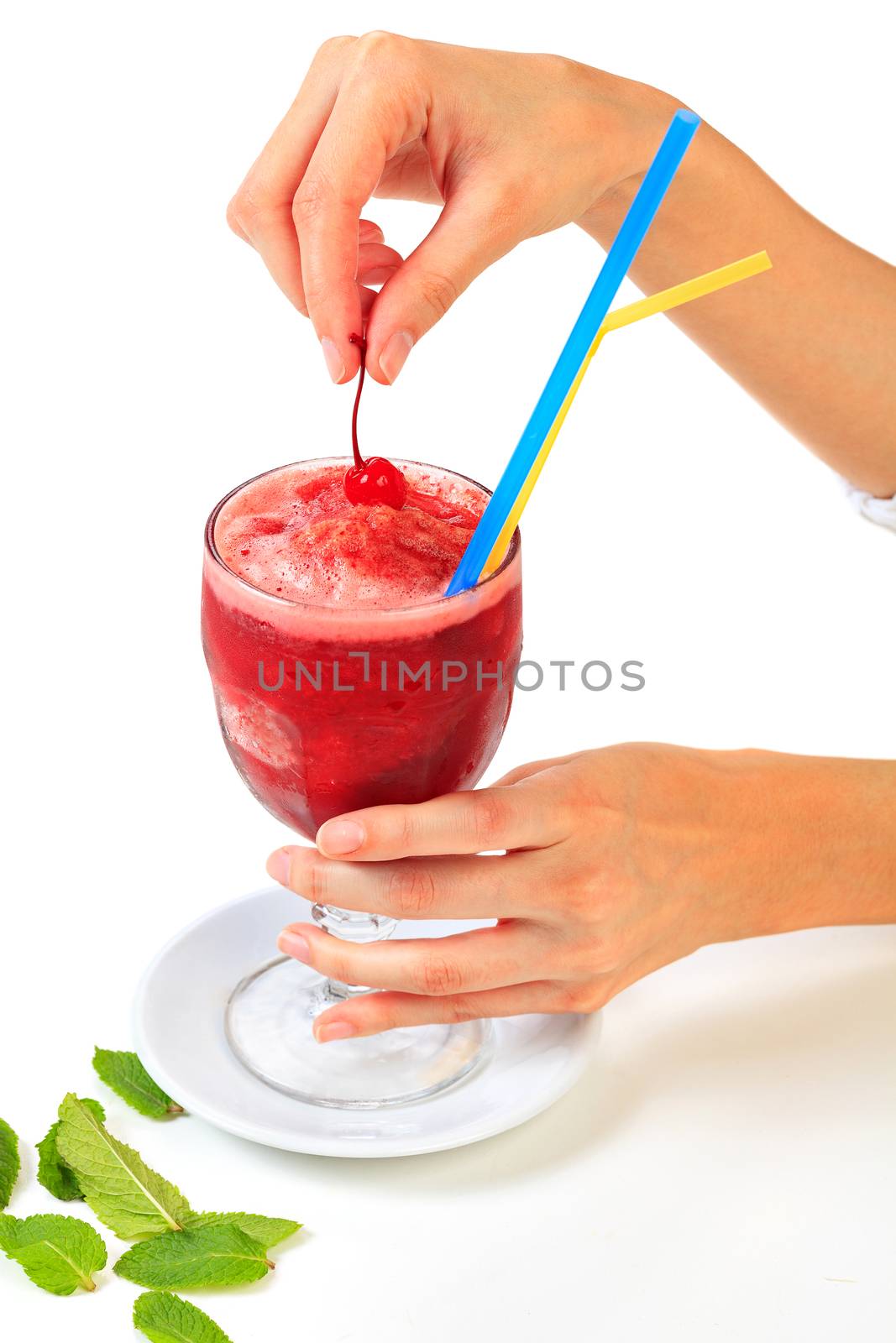 Cherry smoothie in a big glass cup with straws in woman's hands, by Nobilior