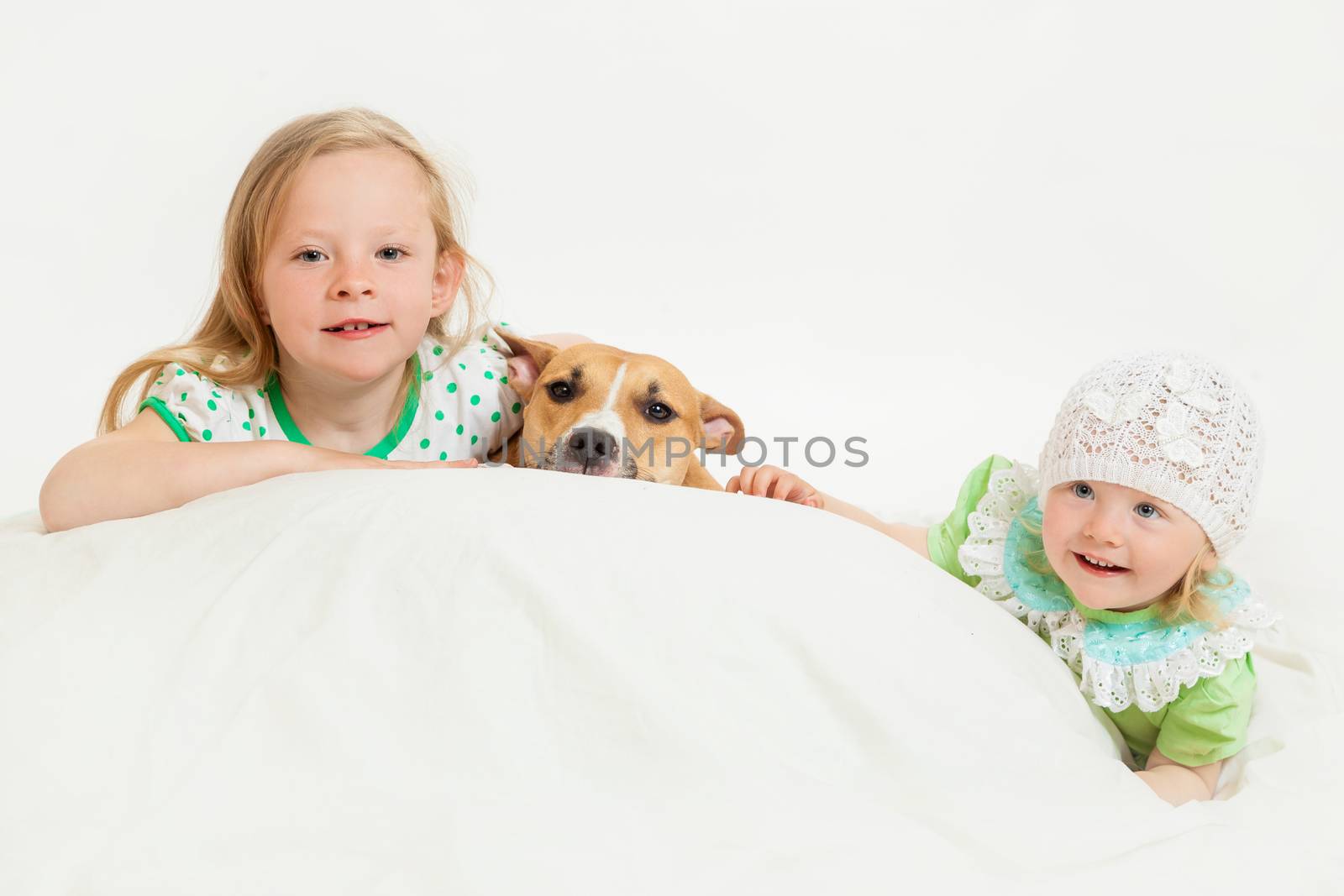 two little girls and dog by sveter