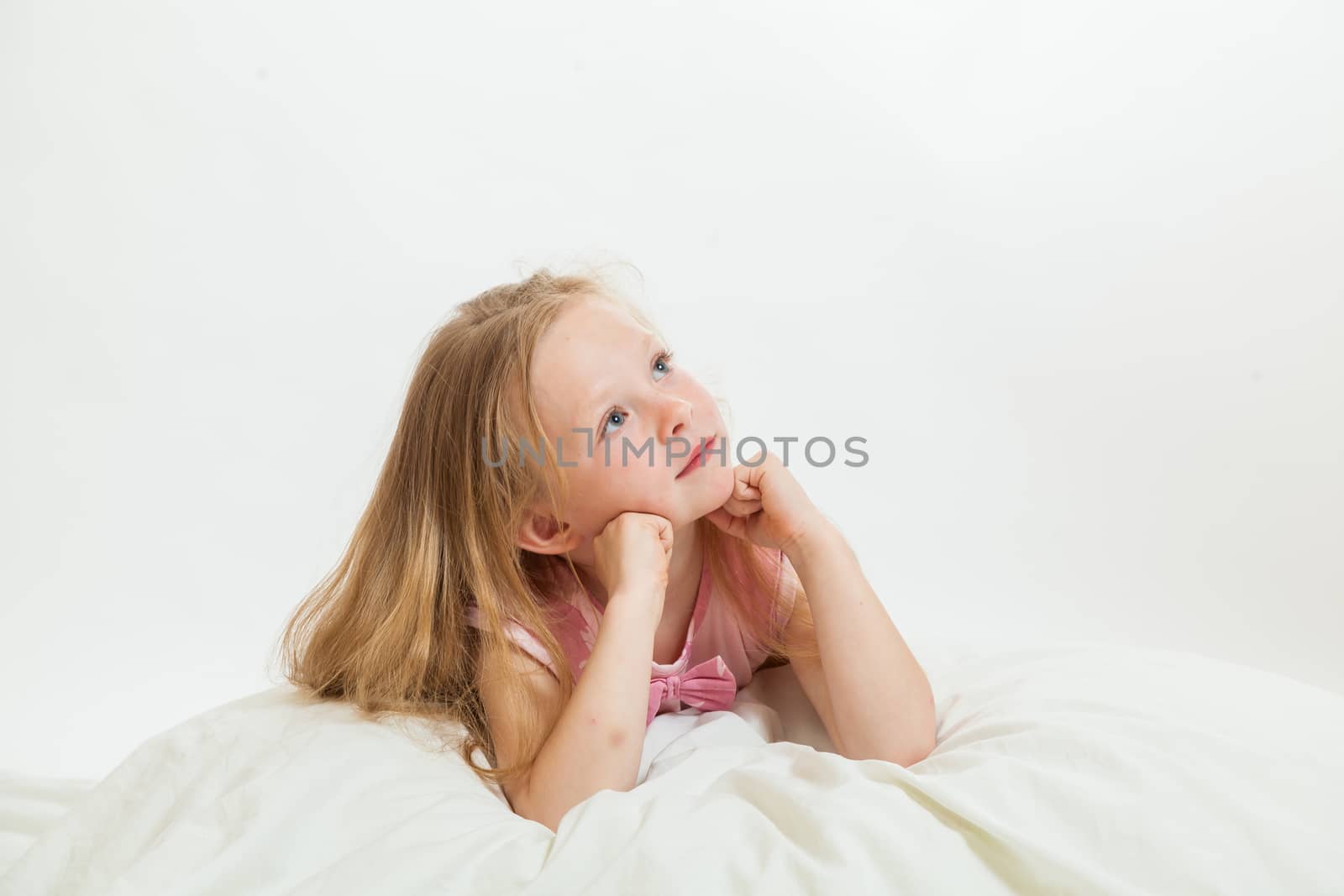 the beautiful little girl on the isolated background